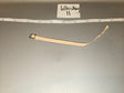 Looking at the item, it appears to be a watch strap/band with a small buckle hardware, measuring approximately 7-8 inches long against the ruler, consistent with 1/6 scale. The tag reads "Whiskey II". 1/6 Scale WWII US Watch Strap - Whiskey II